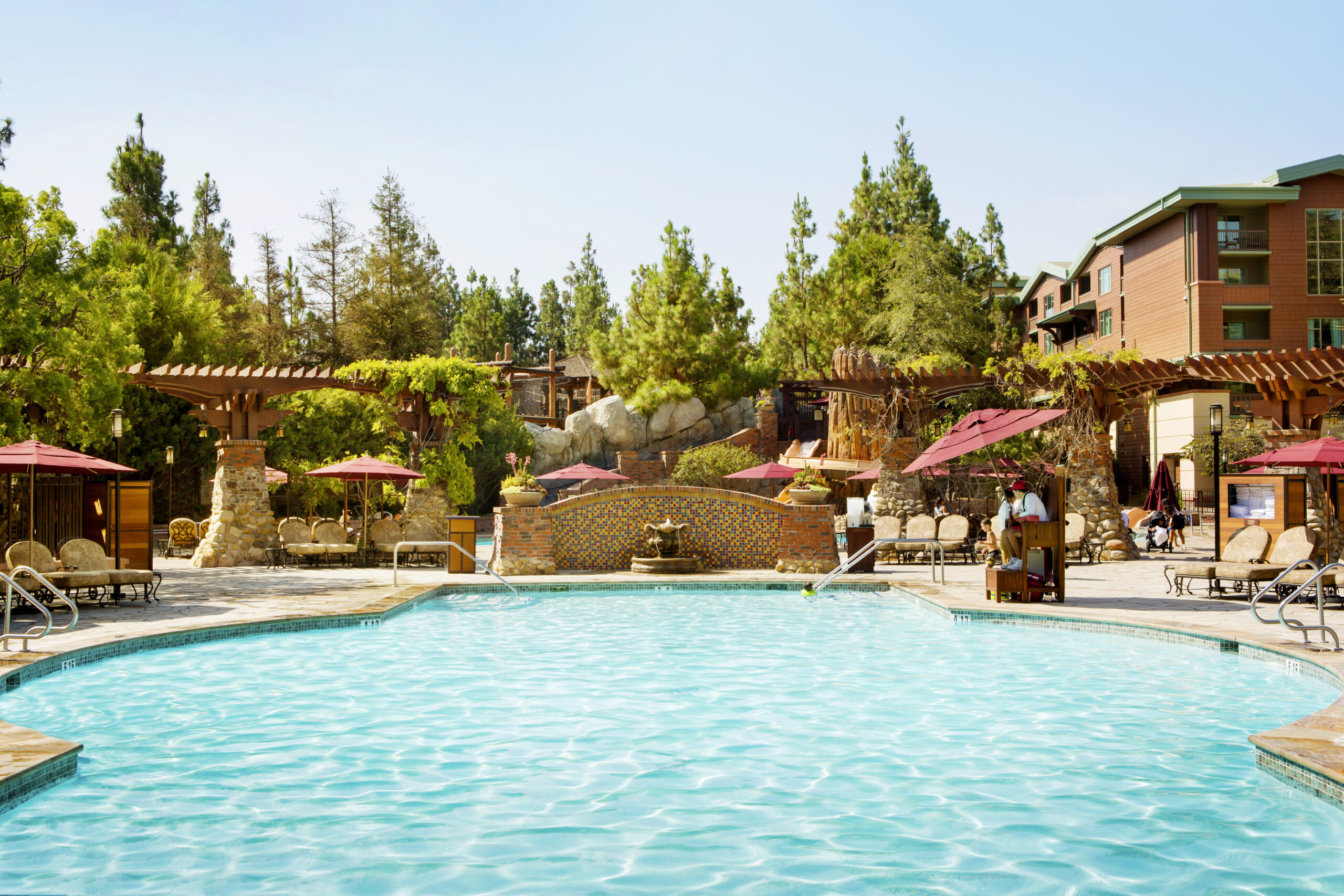 blue pool with lifeguard at Disneyland Grand Californian Hotel in Disneyland