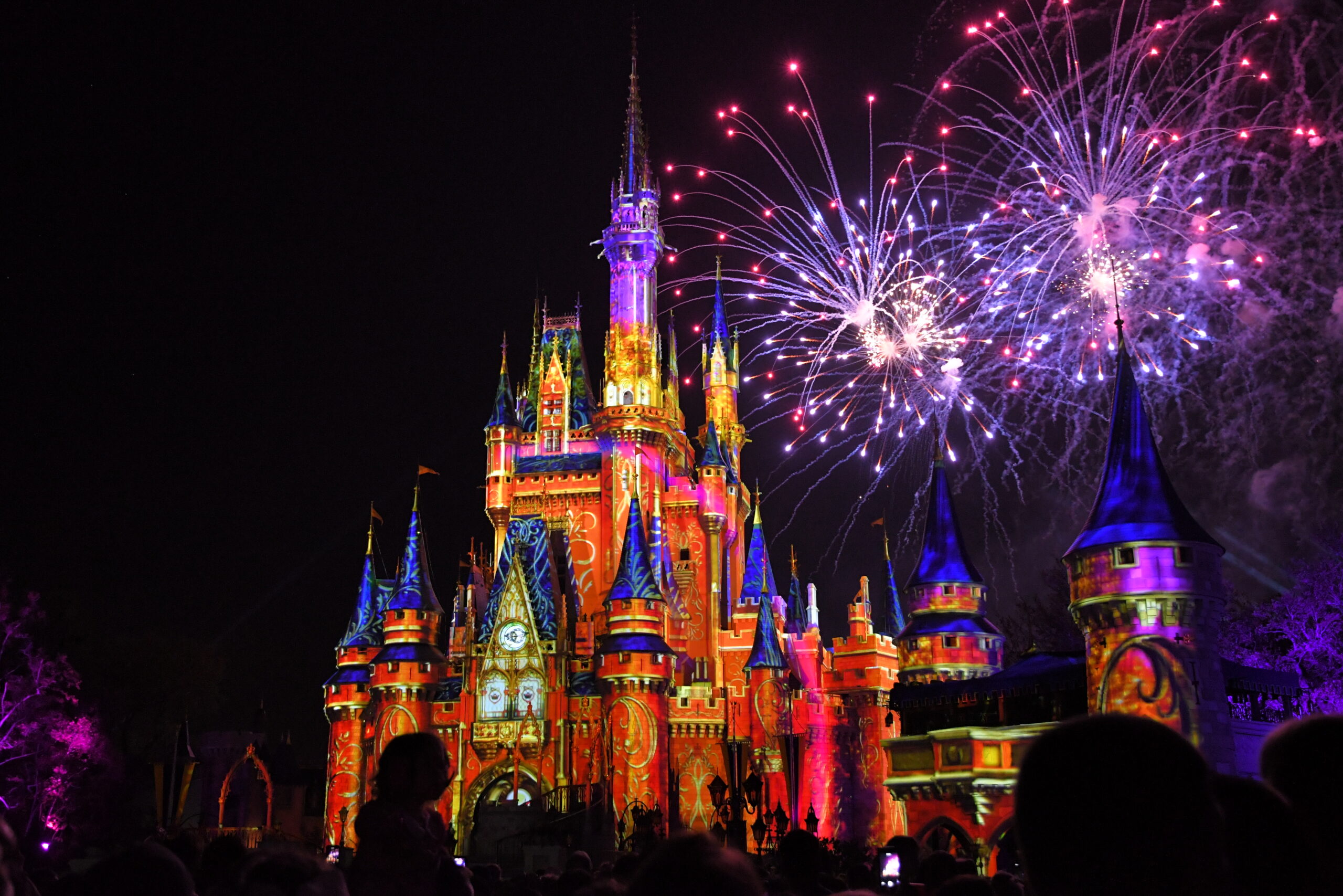 Cinderella's Castle with projections and fireworks during Happily Ever After Fireworks show at Magic Kingdom at Disney World