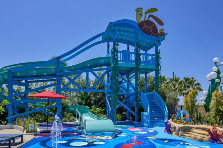 large blue water slide themed after Finding Nemo at Pixar Pier hotel