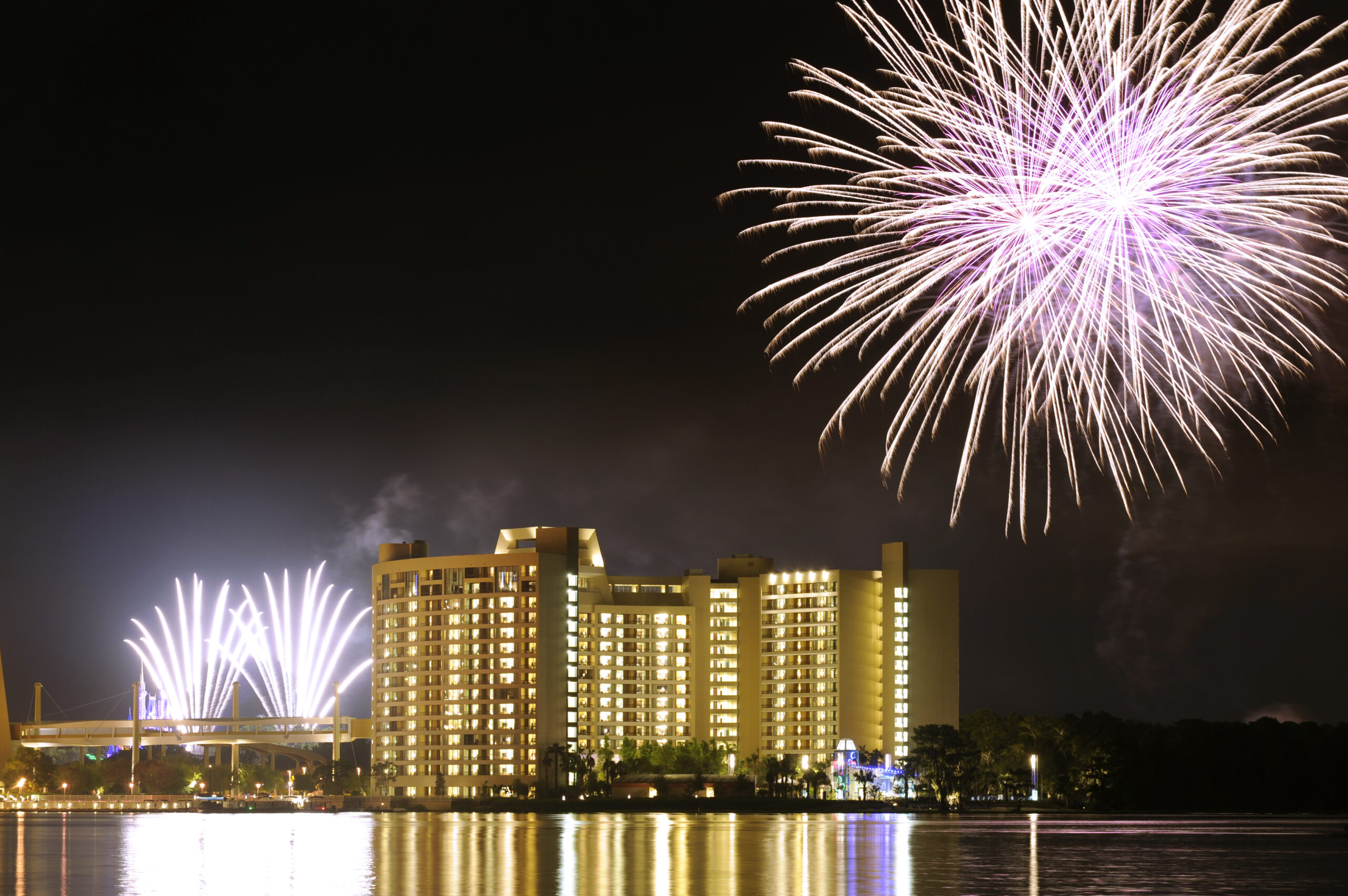 Magic Kingdom Fireworks in sky above Bay Lake Tower at Disney's Contemporary Resort