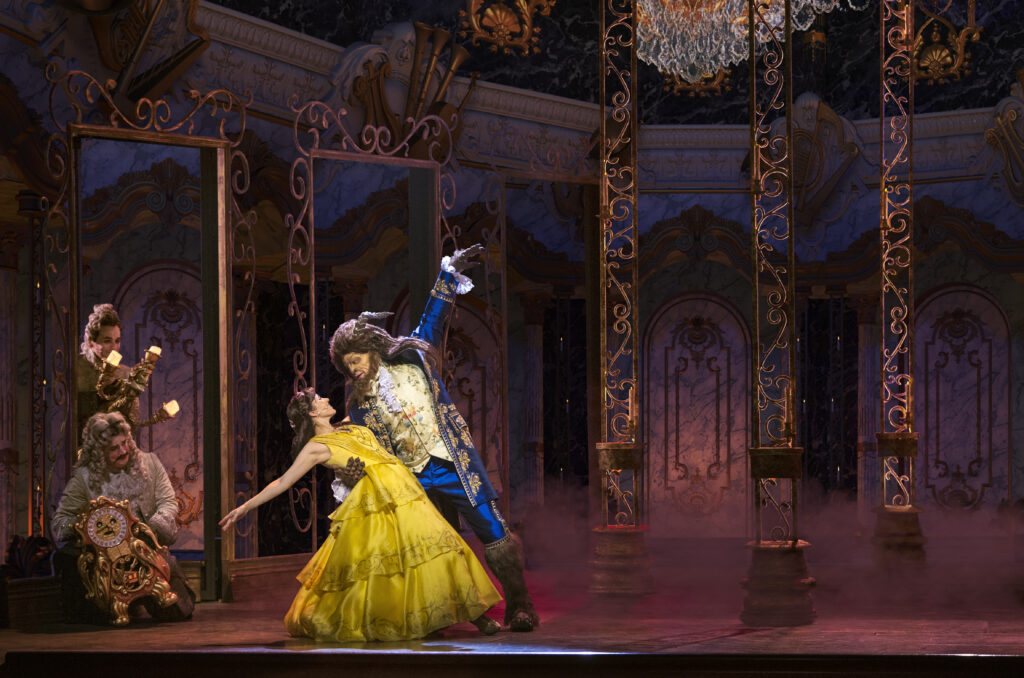 Belle and the Beast dancing on stage during Beauty and the Beast show on Disney Treasure