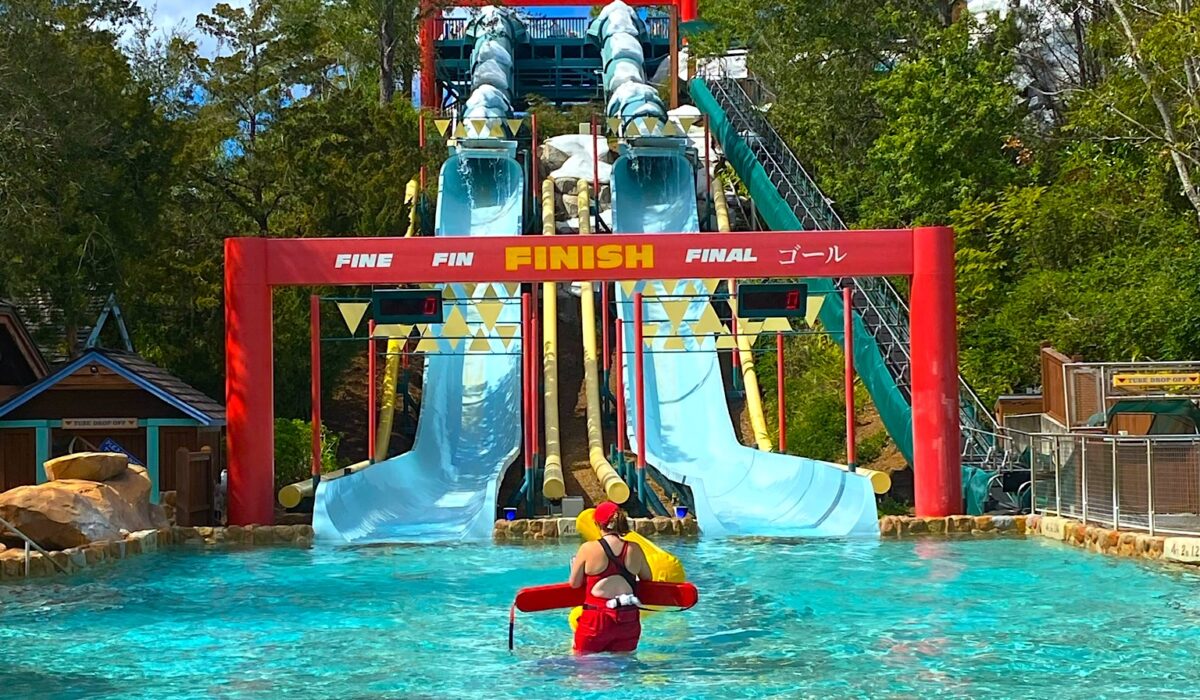 Disney lifeguard watching over the Blizzard Beach slide exit