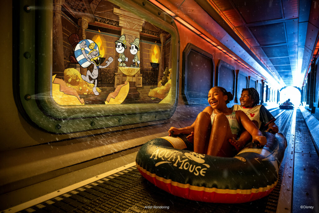 Two girls smiling on Aquamouse raft on Disney Treasure ride