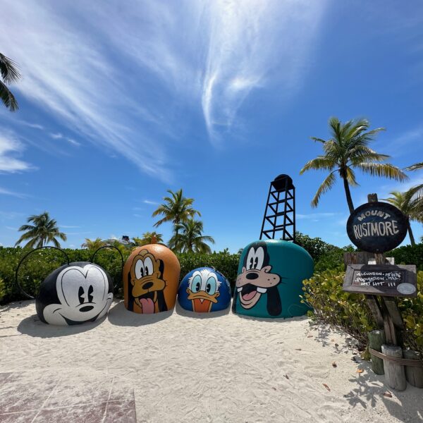Disney Characters painted on Castaway Cay Monument in sand at the Bahamas
