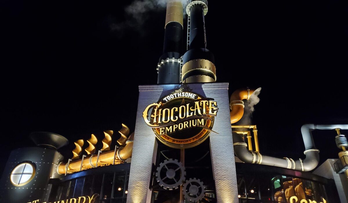 entrance and front of building of Toothsome Chocolate Emporium at Universal Orlando shot at night