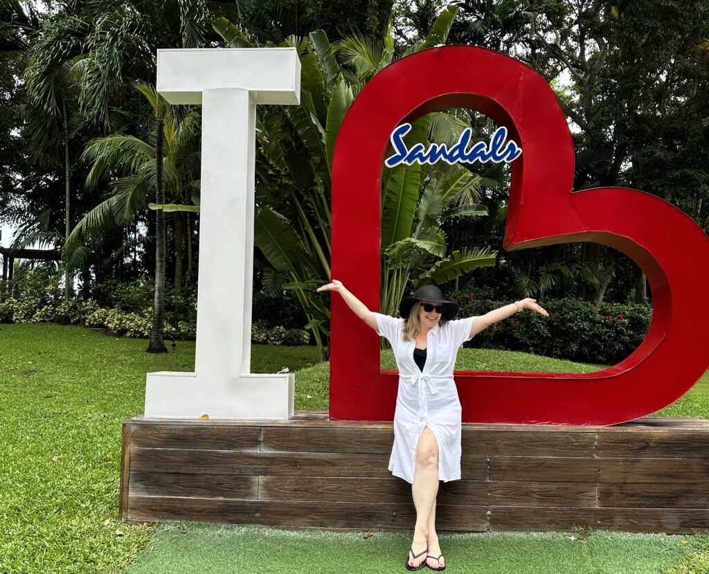 I love sandals sign in front of Sandals Ochi Beach resort