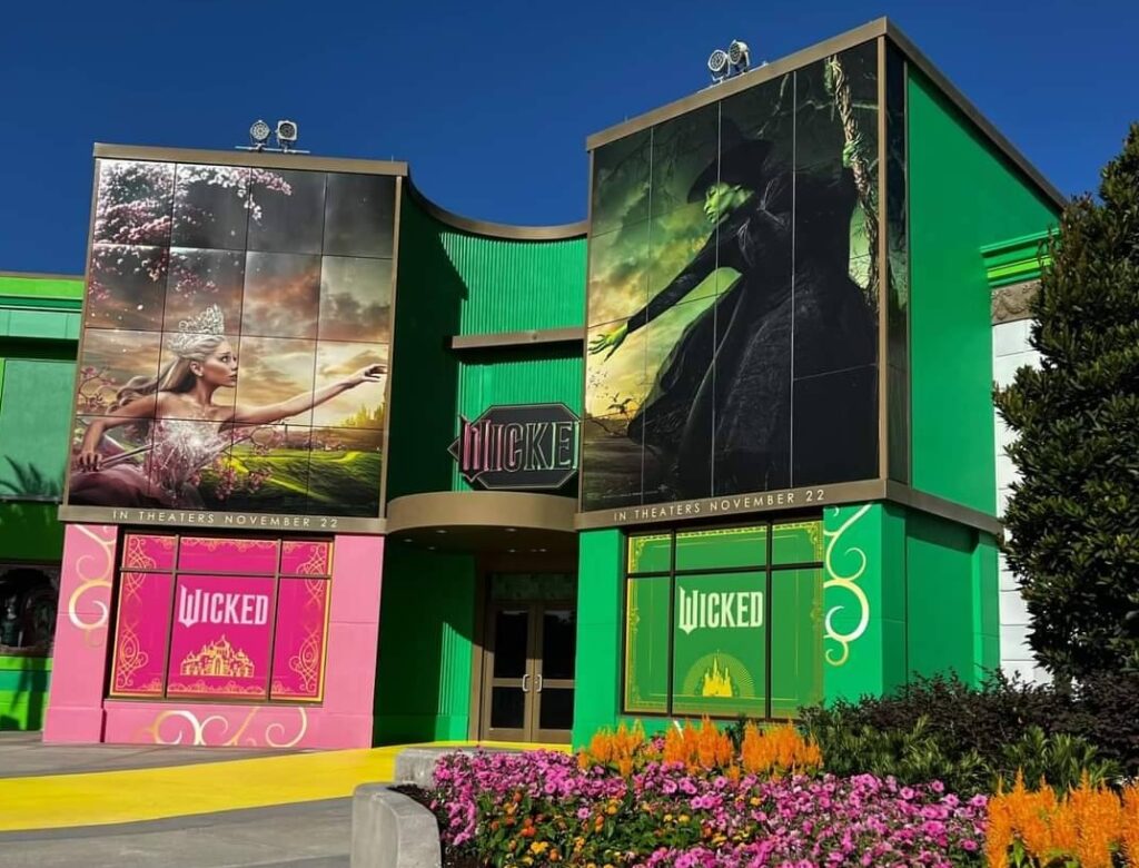 Exterior building overlay with Wicked movie graphics at Universal Orlando